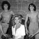 US actress Toni Holt poses with male pinups at the launch of “Playgirl” magazine on March 7, 1974 in Paris, France. Image via AP.